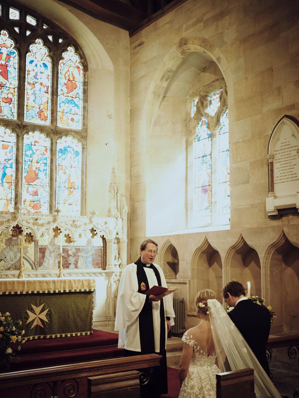 Kneeling at the altar for the Lord’s Prayer with the light streaming through the medieval stained glass windows