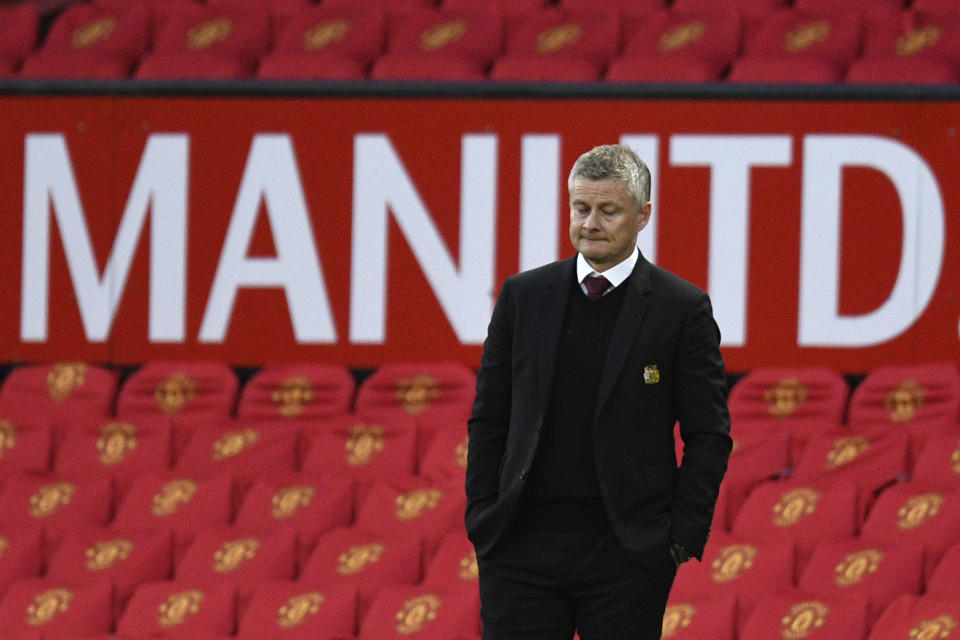 Manchester United's manager Ole Gunnar Solskjaer reacts after Tottenham scored their sixth goal during the English Premier League soccer match between Manchester United and Tottenham Hotspur at Old Trafford in Manchester, England, Sunday, Oct. 4, 2020. (Oli Scarff/Pool via AP)