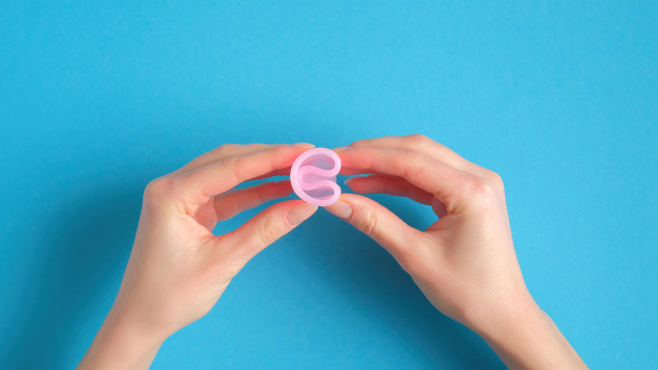 Learning how to put in a menstrual cup is challenging. Familiarize yourself with the <a href="https://www.menstrualcupsaustraliaonline.com.au/menstrual-cup-folds/" target="_blank" rel="noopener noreferrer">different ways of folding a menstrual cup for insertion</a>. (The author is a fan of the &ldquo;punchdown&rdquo; or &ldquo;shell&rdquo; fold.) (Photo: photoguns via Getty Images)