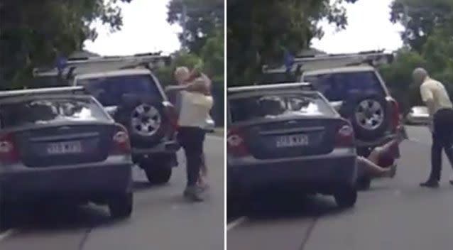 These two men were filmed fighting in a road rage incident at the Glass House Mountains. Source: Dash Cam Owners Australia