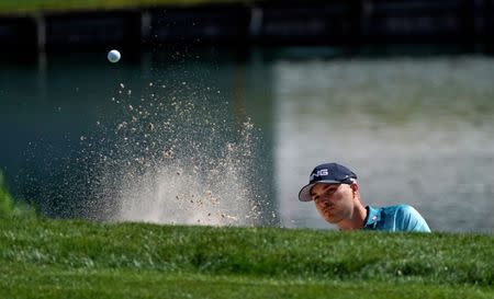 Mar 22, 2019; Palm Harbor, FL, USA; Austin Cooke plays his shot from the bunker on the 12th hole during the second round of the Valspar Championship golf tournament at Innisbrook Resort - Copperhead Course. Mandatory Credit: Jasen Vinlove-USA TODAY Sports