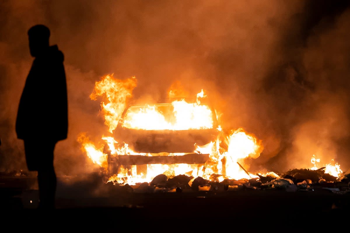 Vehicles were set ablaze during the night in Cardiff (Getty Images)
