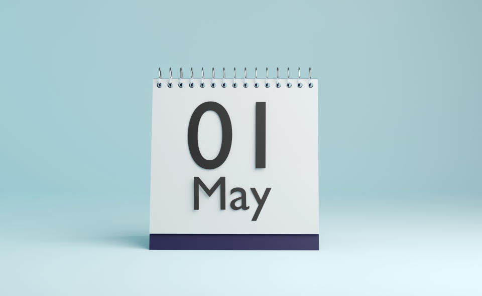 A desktop calendar displays the date "01 May"