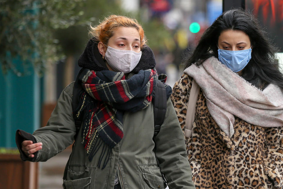  Women wearing masks as a preventive measure against the spread of covid-19 walk along the Street in London. Over 83,200 people have died from Covid-19 in the UK. The government is likely to enforce people must wear a face covering whilst outside, unless they are medically exempt. (Photo by Dinendra Haria / SOPA Images/Sipa USA) 