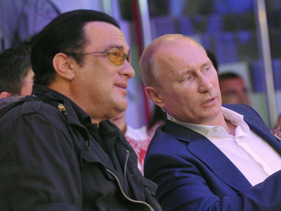 Steven Seagal and Vladimir Putin pictured in 2012 (RIA NOVOSTI/AFP via Getty Images)