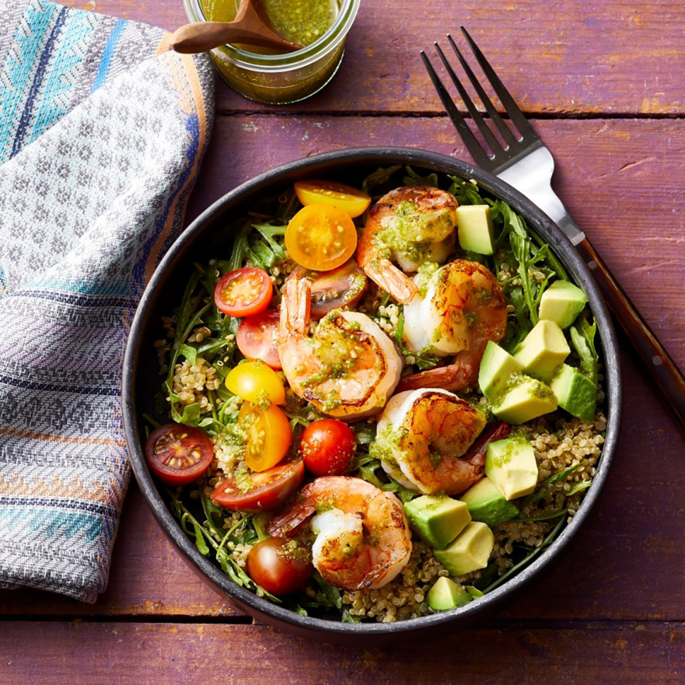 <p>These shrimp and pesto Buddha bowls are delicious, healthy, pretty and take less than 30 minutes to prep. In other words, they're basically the ultimate easy weeknight dinner. Feel free to add additional vegetables and swap the shrimp for chicken, steak, tofu or edamame. <a href="https://www.eatingwell.com/recipe/274095/charred-shrimp-pesto-buddha-bowls/" rel="nofollow noopener" target="_blank" data-ylk="slk:View Recipe;elm:context_link;itc:0;sec:content-canvas" class="link ">View Recipe</a></p>