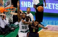 Apr 22, 2016; Boston, MA, USA; Boston Celtics forward Jae Crowder (99) works for the ball against Atlanta Hawks guard Jeff Teague (0) during the fourth quarter in game three of the first round of the NBA Playoffs at TD Garden. Mandatory Credit: David Butler II-USA TODAY Sports