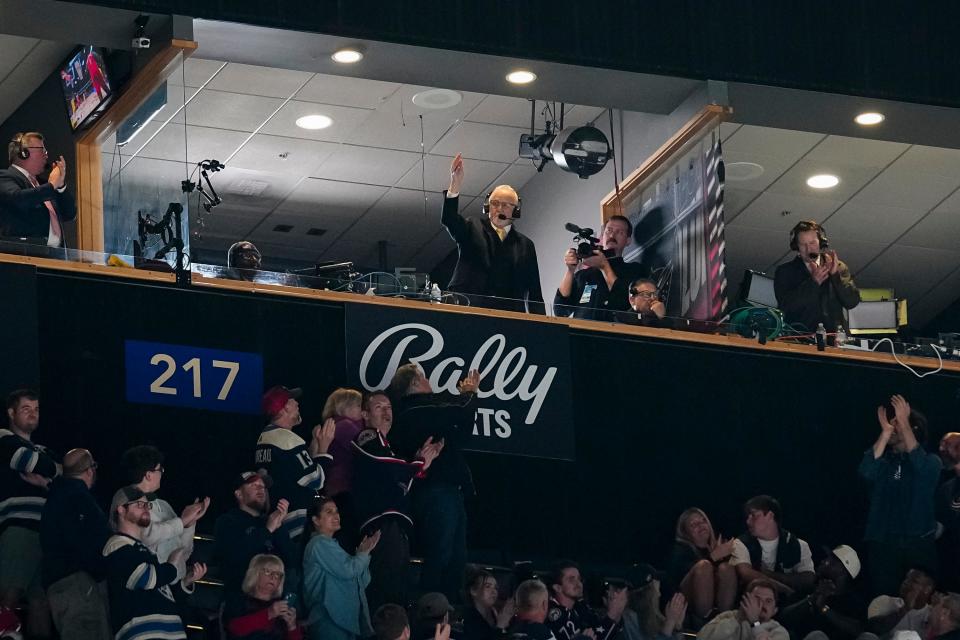 Apr 16, 2024; Columbus, Ohio, USA; Columbus Blue Jackets broadcaster Jeff Rimer waves to the crowd in his final game during the third period of the NHL hockey game against the Carolina Hurricanes at Nationwide Arena.