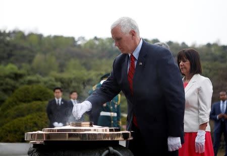 U.S. Vice President Mike Pence visits the National Cemetery in Seoul, South Korea, April 16, 2017. REUTERS/Kim Hong-Ji