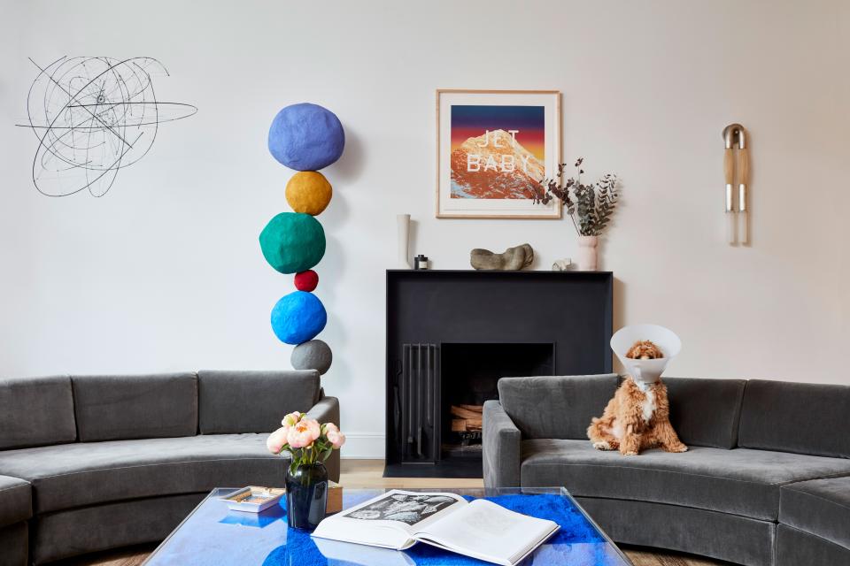 In an effort to support conversation and togetherness, Roth and Rubio opted for facing circular sofas procured from RH and an iconic Yves Klein Blue coffee table smack in the center. Perhaps the most fitting piece of art is Ed Ruscha’s Jet Baby lithograph—a gift from Rubio’s fiancé, Stewart Butterfield—perched above the mantel.
