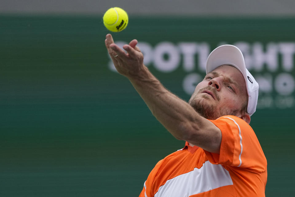 David Goffin, of Belgium, serves to Andy Murray, of Britain, during their match at the BNP Paribas Open tennis tournament Wednesday, March 6, 2024, in Indian Wells, Calif. (AP Photo/Mark J. Terrill)