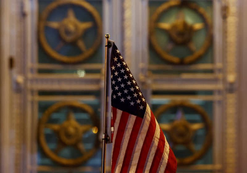 A flag is seen on the U.S. delegation's car, which is parked in front of the headquarters of the Russian Foreign Ministry in Moscow