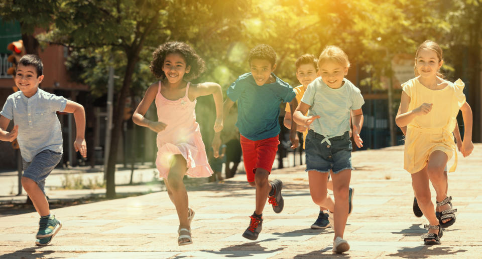 Children running on the street. 