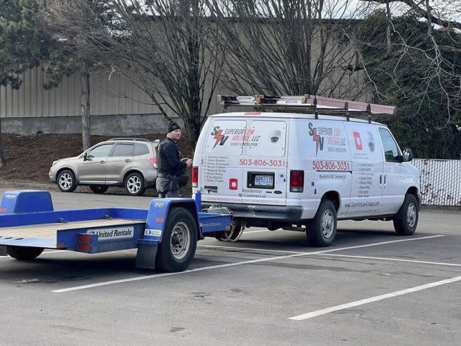 Hood River Police respond to an active shooter in Hood River, Ore. on Thursday, Feb. 2, 2023. Police in Oregon said Thursday that a suspect in what they had described as an active shooter situation was "contained in his house," in the small city of Hood River.(Columbia Gorge News via AP)