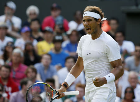 Rafael Nadal of Spain reacts during his match against Dustin Brown of Germany at the Wimbledon Tennis Championships in London, July 2, 2015. REUTERS/Stefan Wermuth