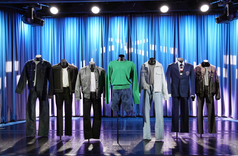 Outfits worn by the Korean pop group BTS for their "Yet to Come" music video are previewed at the K-pop HYBE Exhibit at the Grammy Museum, Friday, June 28, 2024, in Los Angeles. (AP Photo/Chris Pizzello)