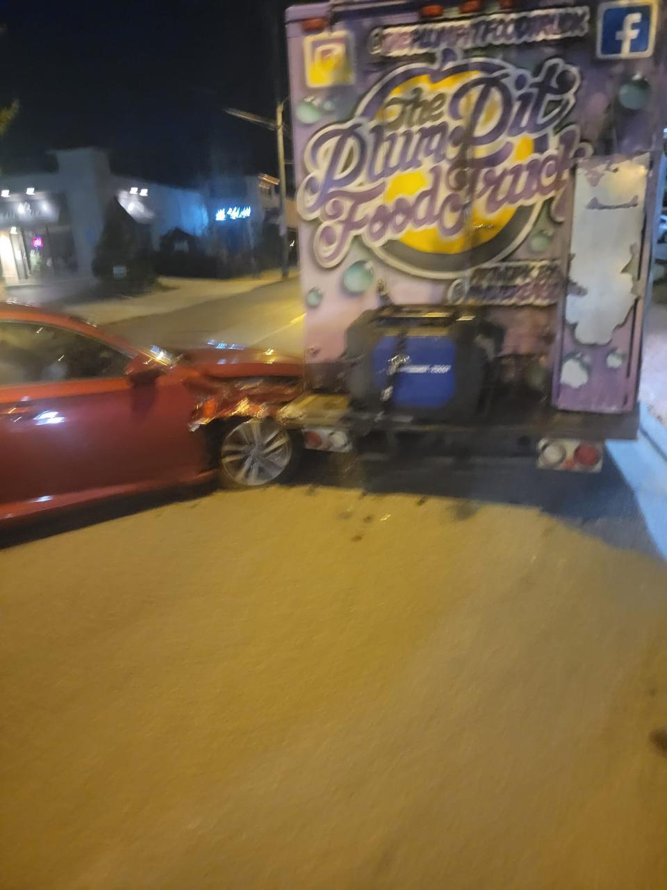 The scene after a car struck the Plum Pit Food Truck on N. Dupont Road in front of Acme Market in Wilmington's Trolley Square area last month.