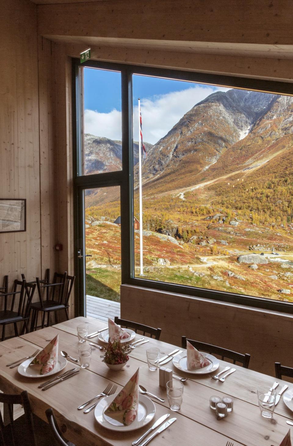 The cabin can accommodate 27 guests, with stunning views of the surroundings throughout the space.