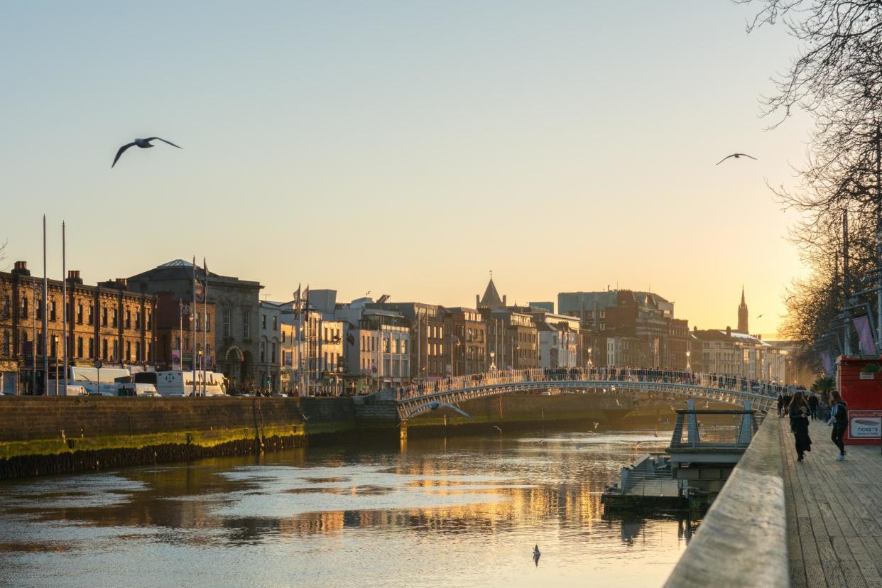 The sun sets over the River Liffey in Dublin, a city with lots of scenic waterside activity: Shutterstock