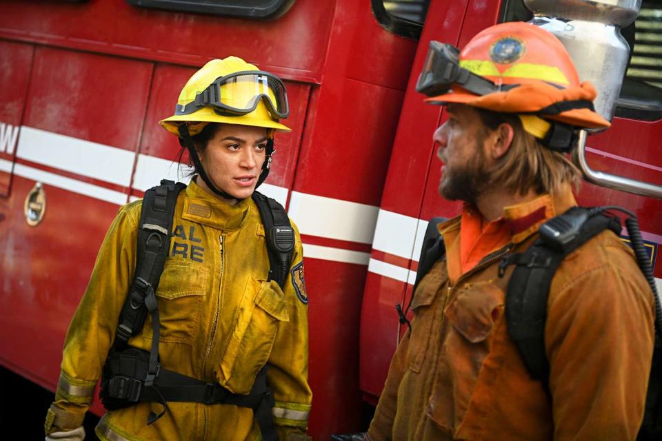 <p>Sergei Bachlakov/CBS </p> From left: Stephanie Arcila as Gabriela Perez and Max Thieriot as Bode Donovan in "Fire Country"