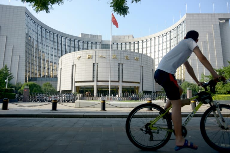 The People's Bank of China has cut its lending and deposit interest rates by 0.25 percentage points each