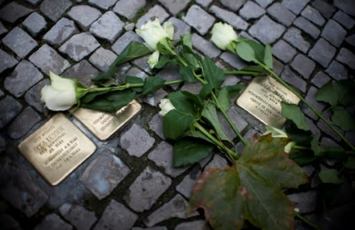 In recent years across Germany on November 9, people have polished brass plaques embedded in pavements bearing the names of Jewish victims