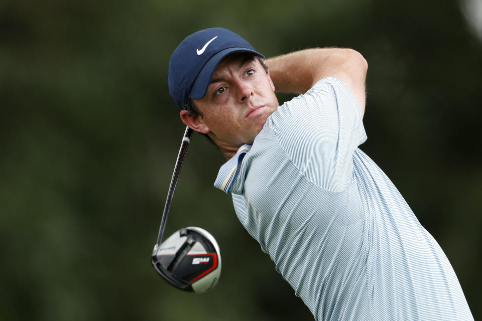 FILE - In this Aug. 24, 2019, file photo, Rory McIlroy hits from the tee on the third hole during third round play in the Tour Championship golf tournament at East Lake Golf Club in Atlanta. McIlroy will take part in a Japan Skins game on Oct. 21 that will be shown live worldwide by Discovery-owned GOLFTV. (AP Photo/John Bazemore, File)