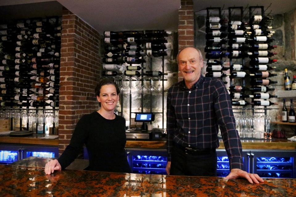 From left, Vino e Vivo server Shannon Ward and owner Tony Callendrello get ready for dinner on Wednesday, March 2, 2022, in Exeter.