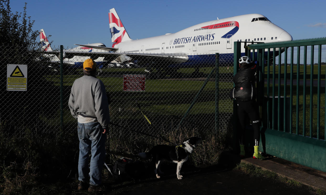 Retired British Airways Boeing 747-400 parked at Cotsworld Airport in Kemble, England, Sunday, Oct. 11, 2020. The retirement of the Jumbo Jet fleet was brought forward as a result of the impact the COVID-19 pandemic had on the airline and the aviation sector. (AP Photo/Frank Augstein)