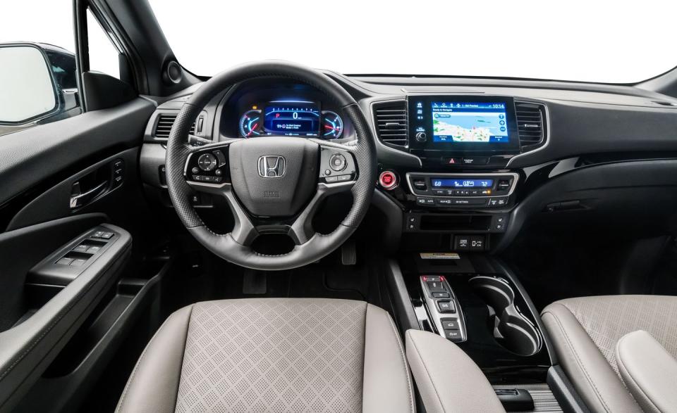 <p>The dashboard, steering wheel, and center console are all exactly the same as the Pilot's.</p>