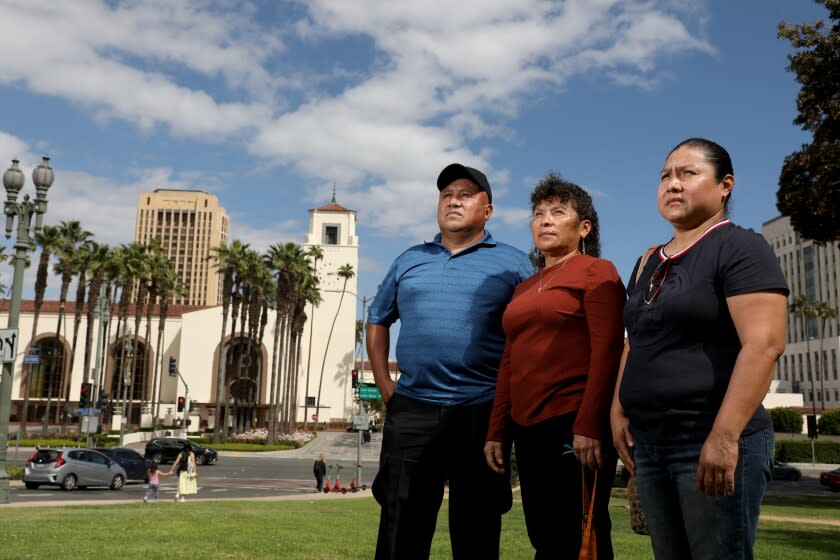 LOS ANGELES, CA - APRIL 16: Gerardo Mixcoatl (cq), left, Rutilia Martinez, and Alberta Mendez, maintenance workers at Union Station, claim they have been attacked by homeless people while working at the station in downton, on Saturday, April 16, 2022 in Los Angeles, CA. The janitors at Union Station say violence and harassment have become so bad, they fear for their life. (Gary Coronado / Los Angeles Times)