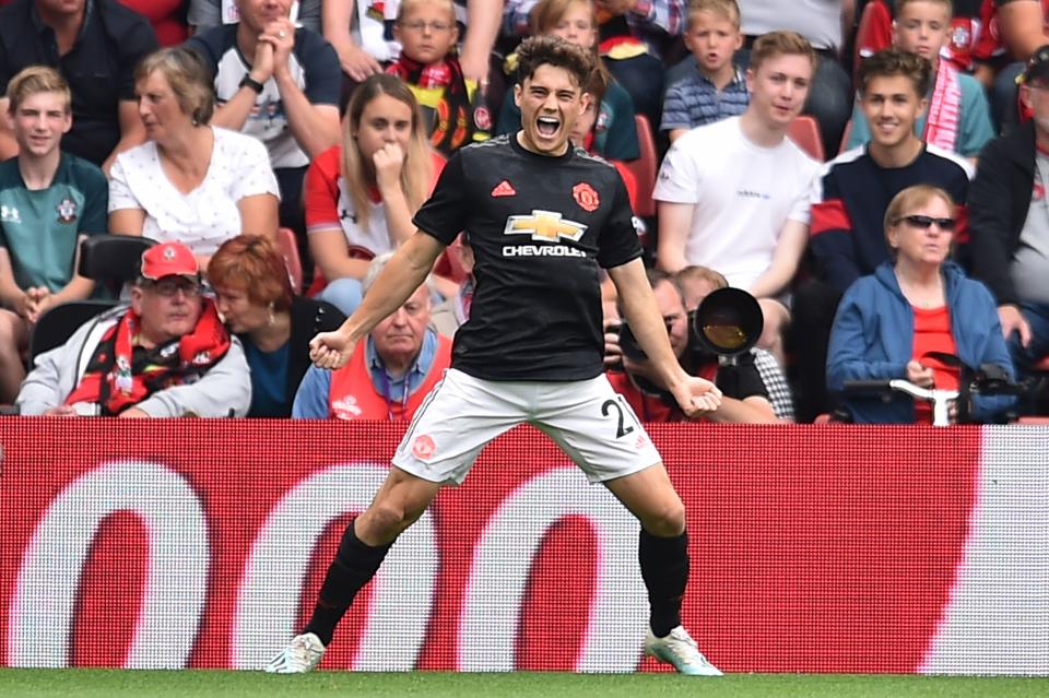 Manchester United's Welsh midfielder Daniel James celebrates scoring the opening goal during the English Premier League football match between Southampton and Manchester United at St Mary's Stadium in Southampton, southern England on August 31, 2019. (Photo by Glyn KIRK / AFP) / RESTRICTED TO EDITORIAL USE. No use with unauthorized audio, video, data, fixture lists, club/league logos or 'live' services. Online in-match use limited to 120 images. An additional 40 images may be used in extra time. No video emulation. Social media in-match use limited to 120 images. An additional 40 images may be used in extra time. No use in betting publications, games or single club/league/player publications. /         (Photo credit should read GLYN KIRK/AFP/Getty Images)