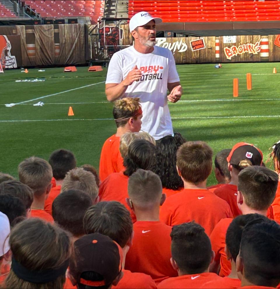 Kevin Stefanski talks to participants at the Under the Lights Camp at Cleveland Browns Stadium on Thursday.