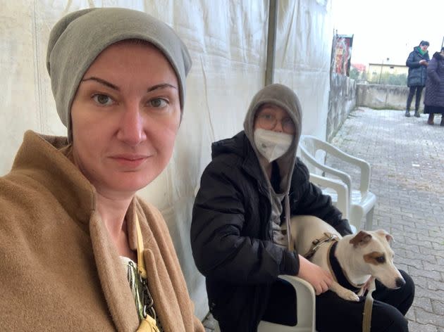 The author with her younger son and their dog on the first day in the Italian town they're calling home, which they reached after four days of travel. (Photo: Courtesy of Maria Zavialova)