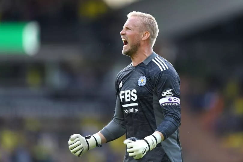 Kasper Schmeichel celebrates Leicester City's 2-1 win at Norwich City