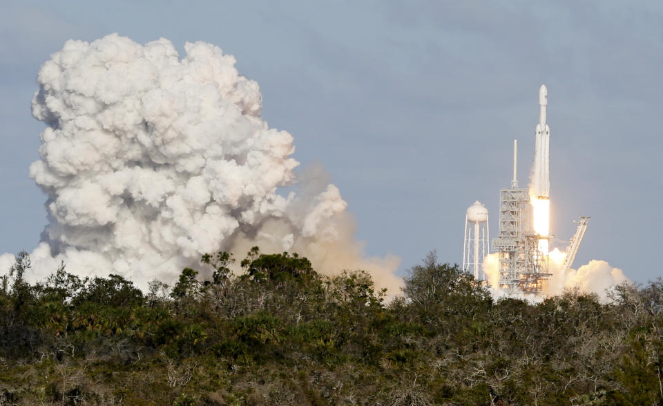 <p>A SpaceX Falcon Heavy rocket lifts off from historic launch pad 39-A at the Kennedy Space Center in Cape Canaveral, Fla., Feb. 6, 2018. (Photo: Joe Skipper/Reuters) </p>