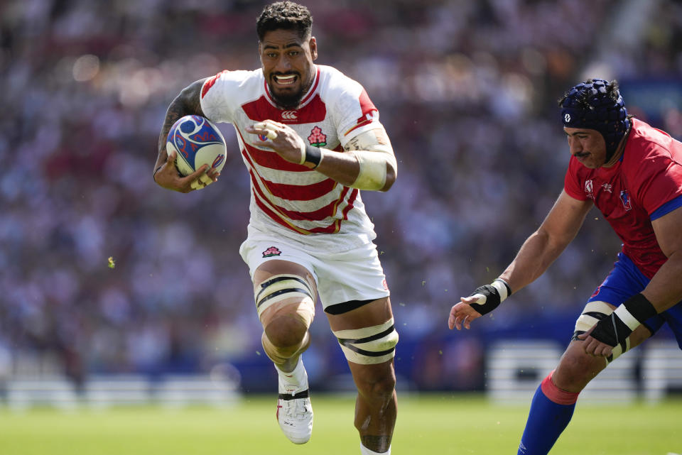 Japan's Amato Fakatava runs to score his team's first try during the Rugby World Cup Pool D match between Japan and Chile at Stadium de Toulouse, Toulouse, France, Sunday, Sept. 10, 2023. (AP Photo/Lewis Joly)