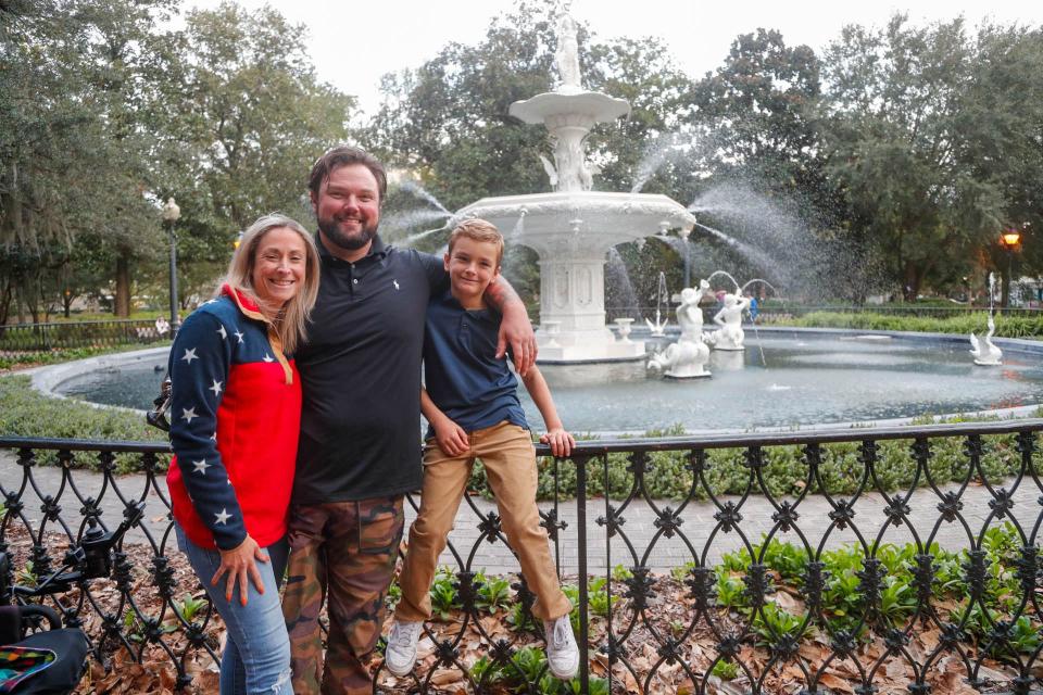 Sgt. 1st Class Ryan Davis stands with his wife Asia and son Knox at the fountain in Forsyth Park. Ryan is a triple amputee due to injuries suffered from a blast while conducting a mission in Afghanistan with the U.S. Army 1st Ranger Battalion.