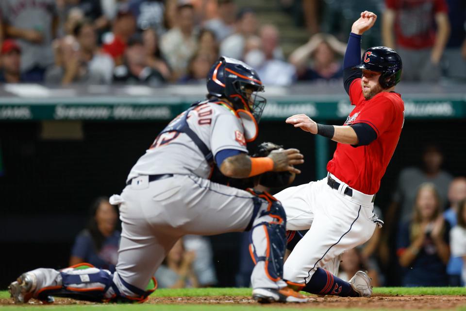 Guardians base runner Owen Miller scores past Houston Astros catcher Martin Maldonado on a single by Luke Maile in the seventh inning of Friday night's game at Progressive Field. The Astros won 9-3. [Ron Schwane/Associated Press]