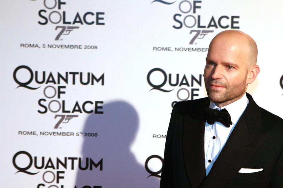 Director Marc Forster is photographed as he arrives for the screening of the new James Bond movie 