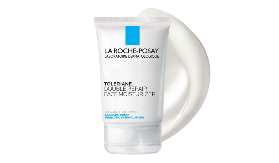 Tube of La Rocke Posay double repair face moisturizer shown with smear of cream behind it. 