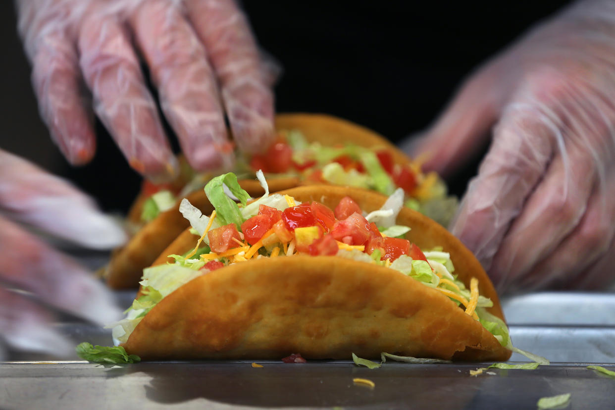 BOSTON, MA - DECEMBER 4: Tacos are made to order at the new Taco Bell Cantina in Brookline, MA on Dec. 4, 2020. The new Taco Bell on Boston University's campus on Commonwealth Ave. served alcohol. (Photo by John Tlumacki/The Boston Globe via Getty Images)