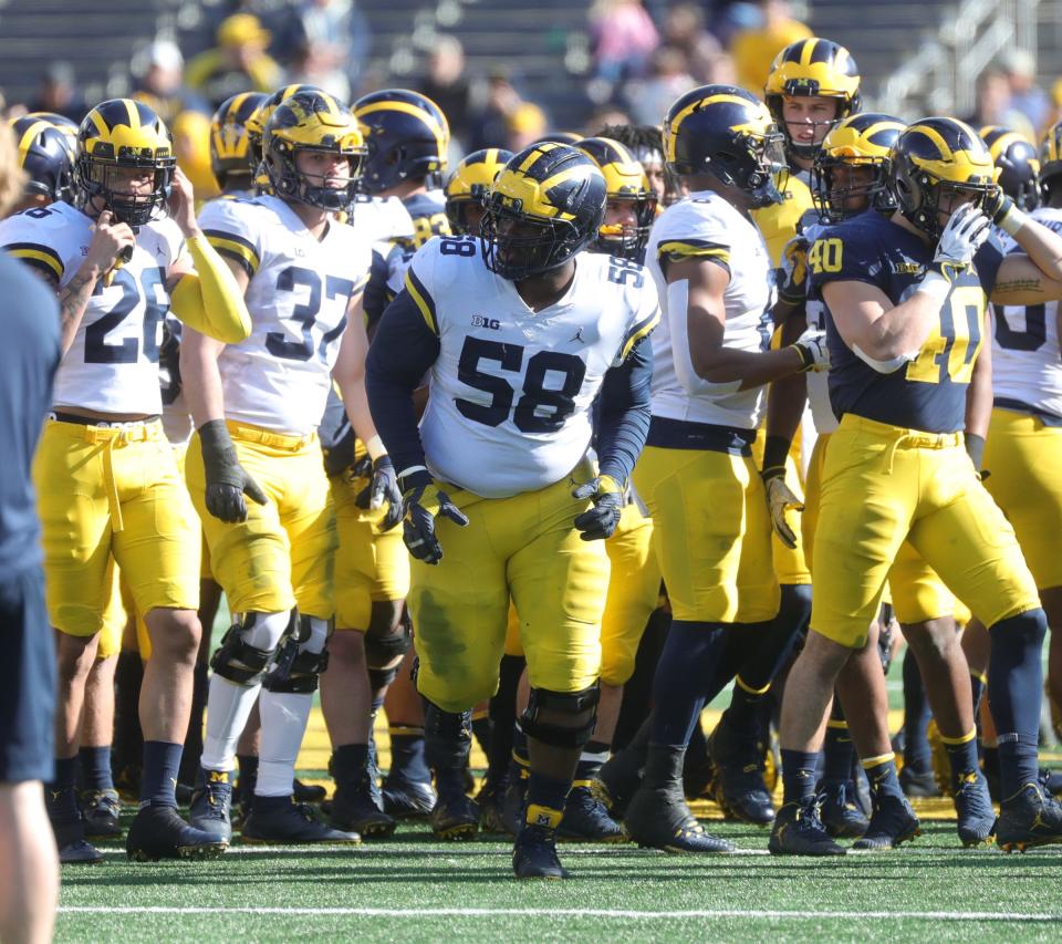 Michigan's Mazi Smith (58) takes the field for the spring game Saturday, April 13, 2019 at Michigan Stadium in Ann Arbor.