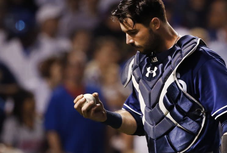 Austin Hedges left Monday's game following a collision with Anthony Rizzo. (AP Photo)