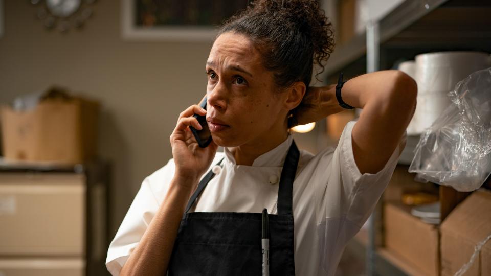 Carly (Vinette Robinson) on the phone in Boiling Point episode 1