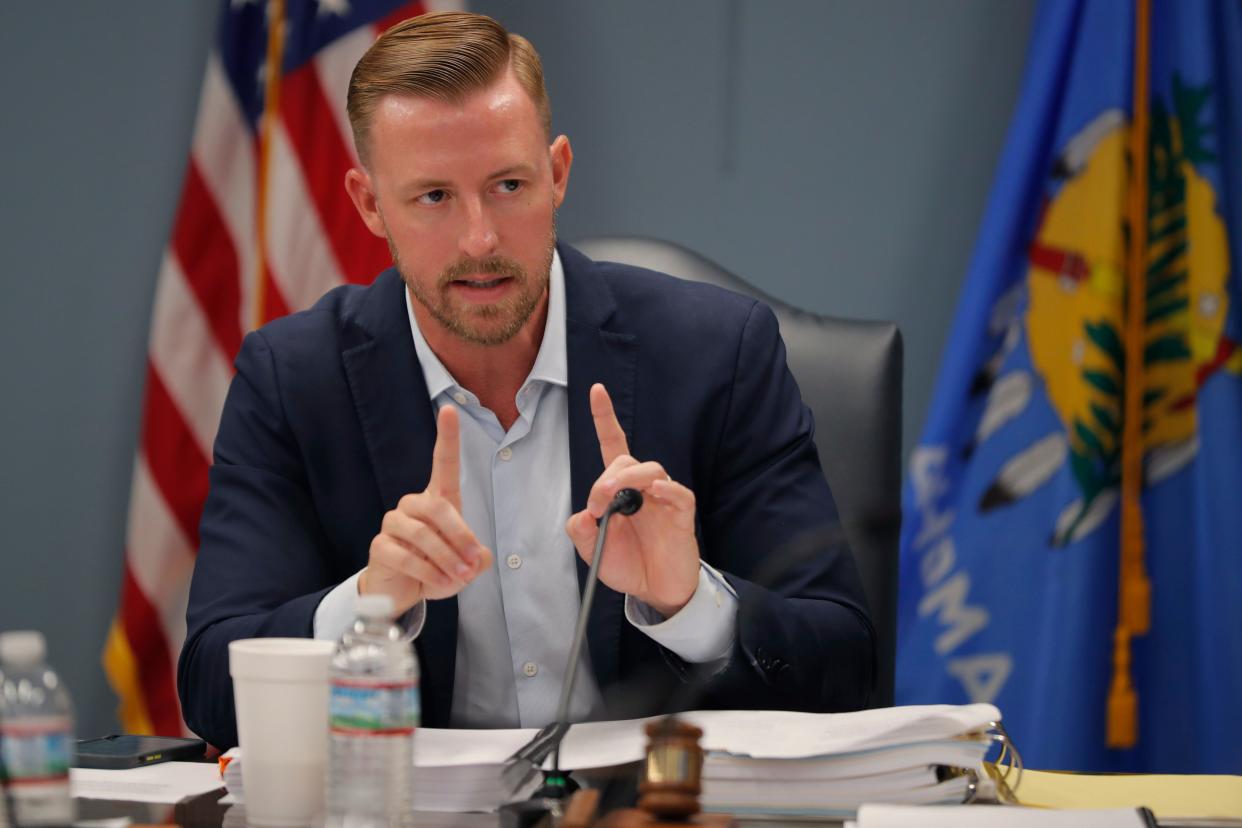 Oklahoma state schools Superintendent Ryan Walters speaks during an Oklahoma State Board of Education meeting. On Tuesday, Walters said his department was launching an investigation into the "unacceptable" appointment of a "drag queen" as a school principal.