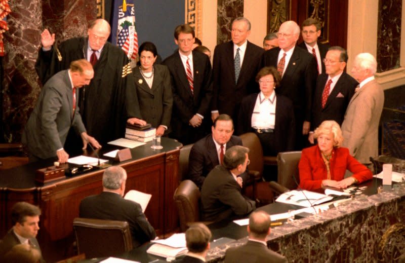 U.S. Supreme Court Chief Justice William Rhenquist is sworn in to preside over the Senate trial of President Bill Clinton, January 7, 1999, in the Senate chamber. UPI File Photo