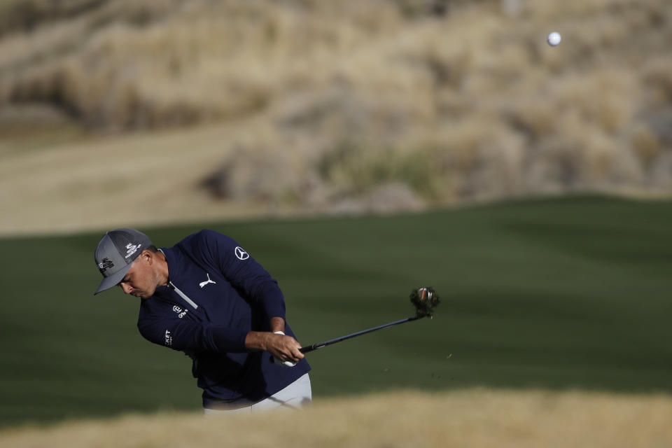 Rickie Fowler chips from the 10th fairway during the second round of the American Express golf tournament on the Nicklaus Tournament Course at PGA West on Friday, Jan. 17, 2020, in La Quinta, Calif. (AP Photo/Marcio Jose Sanchez)