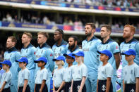 England's players line up for the national anthems. (Photo by Gareth Copley-IDI/IDI via Getty Images)