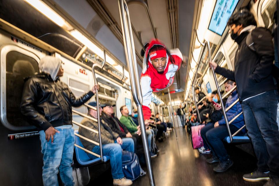 Doc Jr. with W.A.F.F.L.E. NYC performs on the subway in New York City, NY on Wednesday, November 16, 2022.